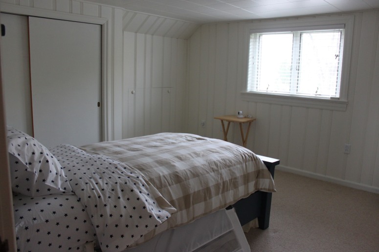 DIY painted wood paneling & twin farmhouse bed | The Sensible Home
